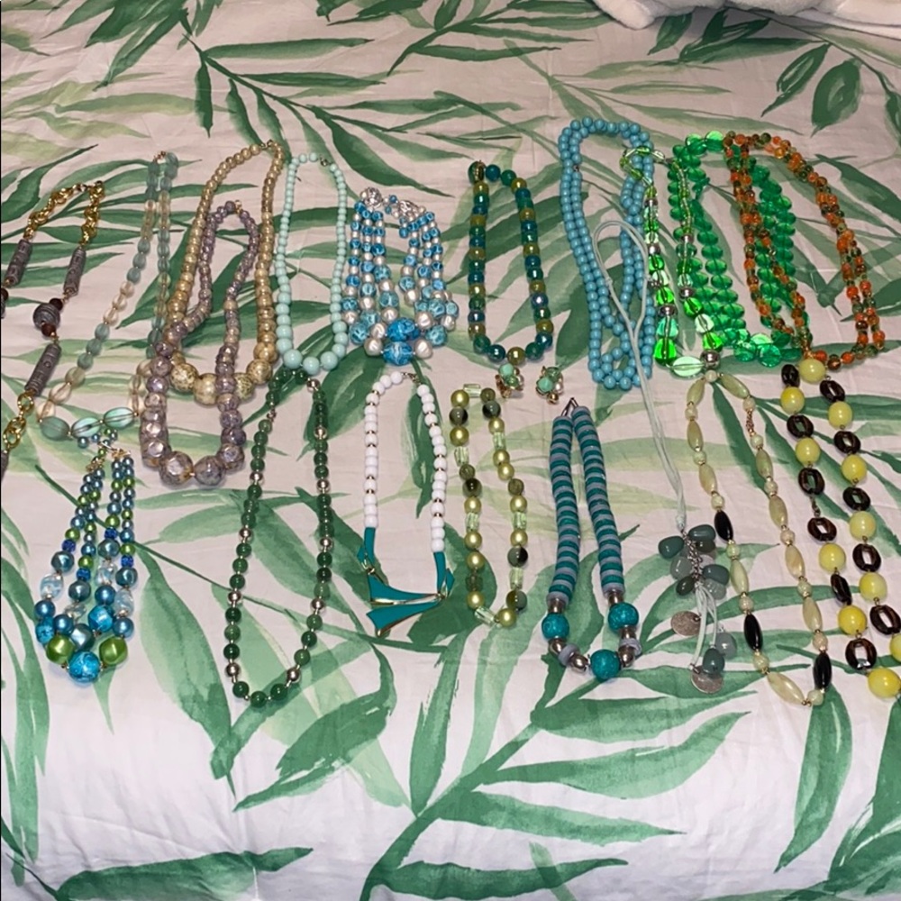 Bundle of green vintage costume jewelry necklaces